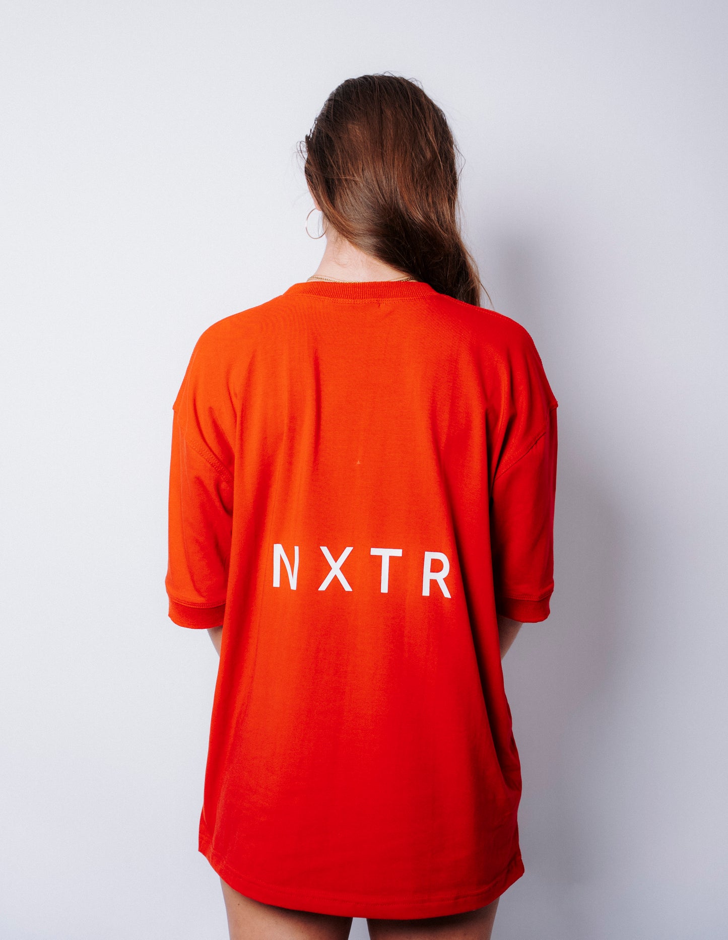 NXTR Red — wear it like you mean it.