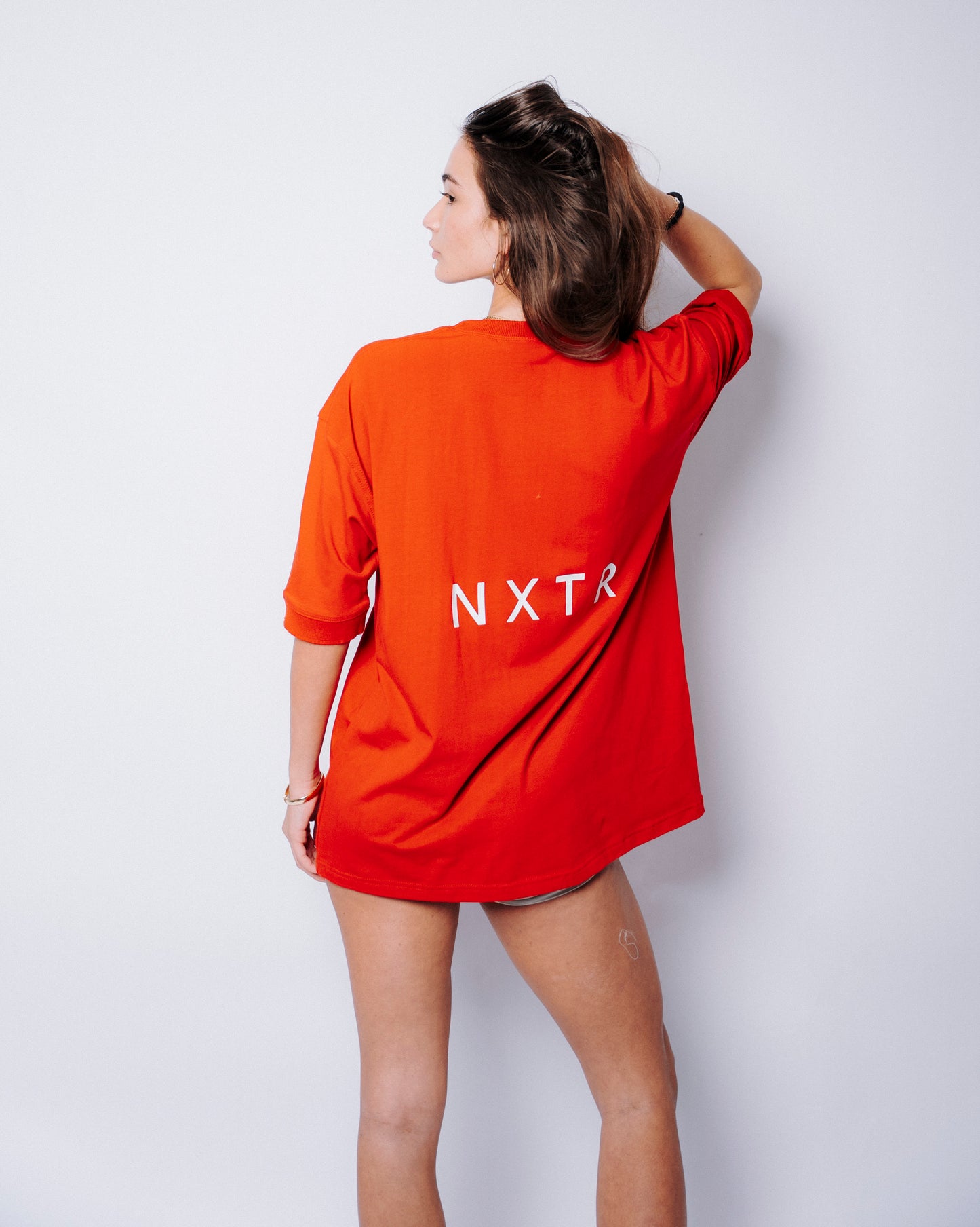 NXTR Red — wear it like you mean it.